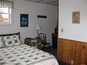 Queen bed in the Gooseberry Room