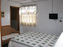 Comfortable Bed with a Television