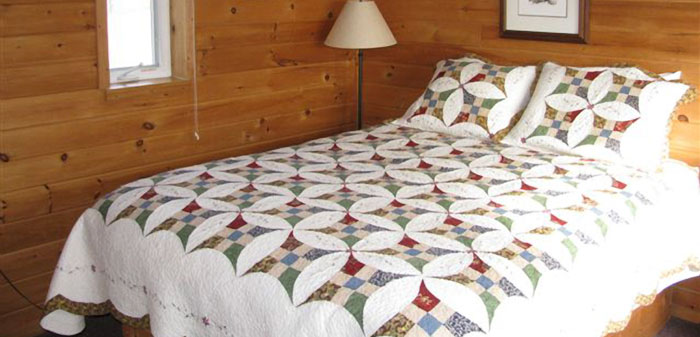 Queen bed in Lake Superior Cabin