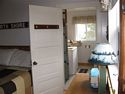 Bed and bathroom area