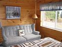 Couch and bed in the Tettegouche Room